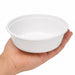 Bol rond blanc en plastique PP - 350 ml - Ø 14,2 cm - H 4,8 cm - en main